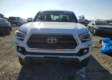 2017 Toyota Tacoma Access Cab z USA, uszkodzony, nr VIN 5TFSZ5AN2HX085612
